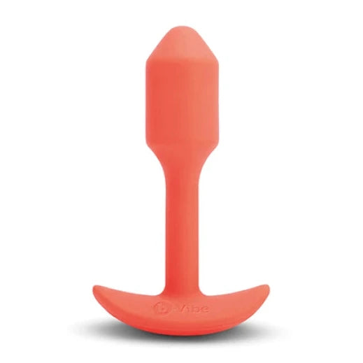 Orange silicone butt plug on a white background