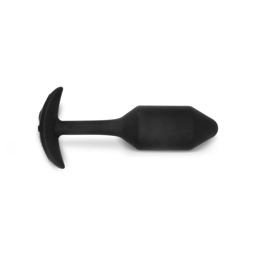 Black silicone butt plug on a white background