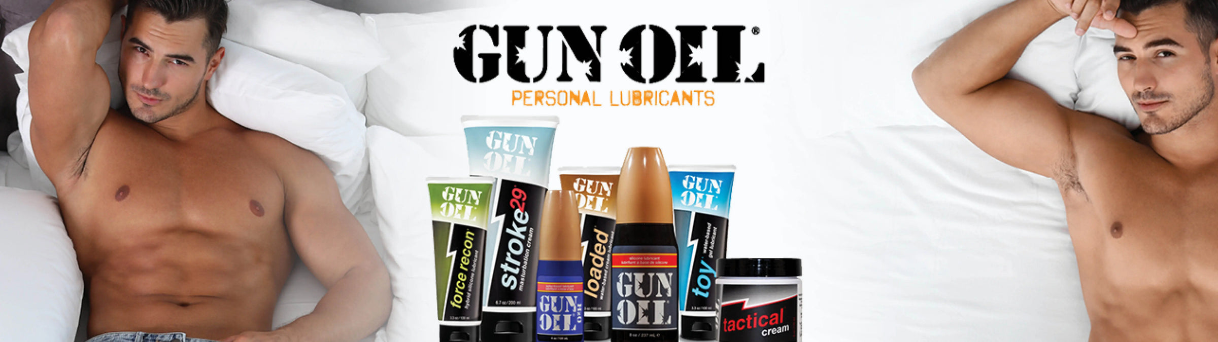 gun oil personal sex lubricants displayed next to a man in bed